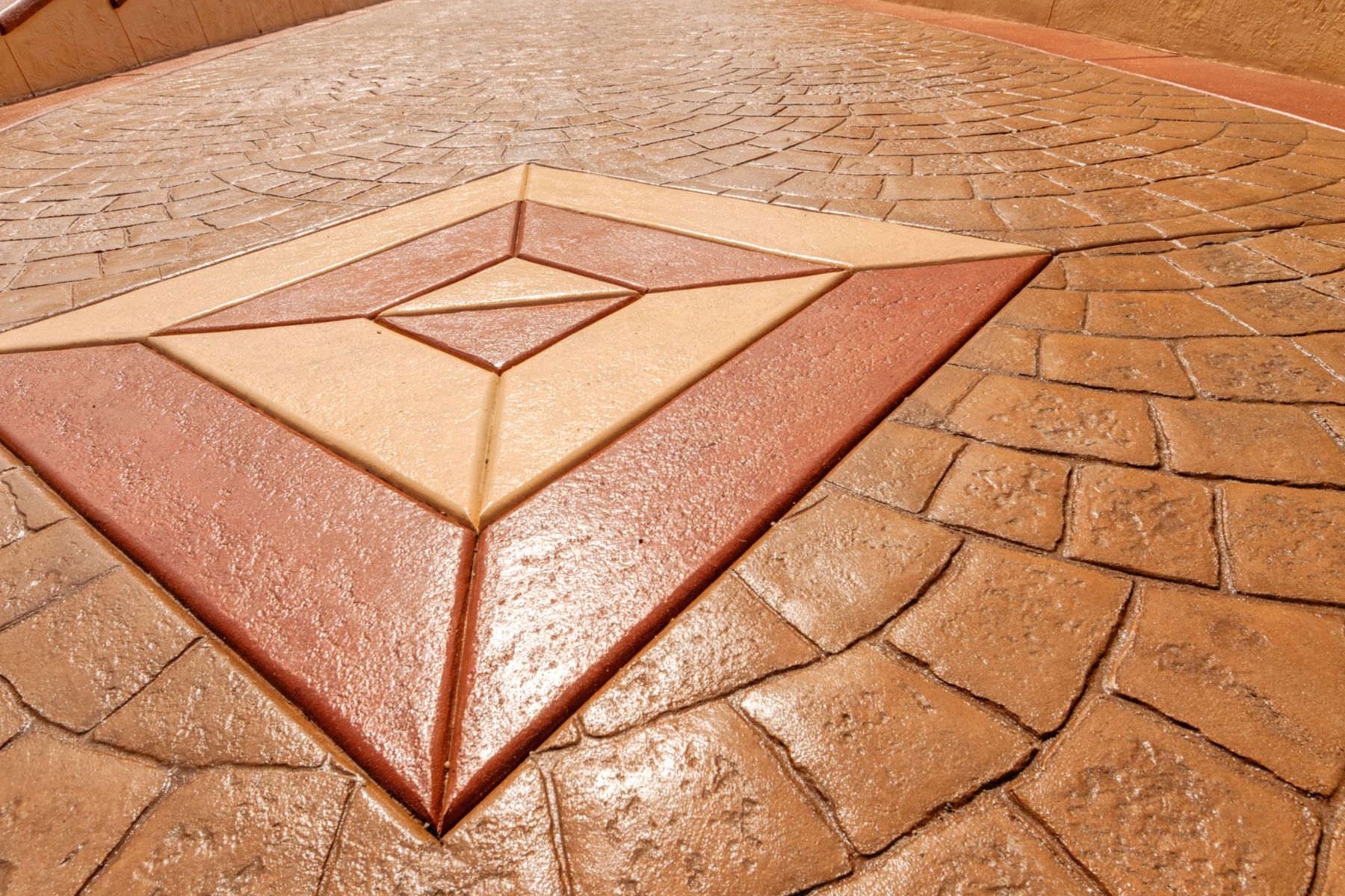 Stamped concrete patio and driveway finish in Austin